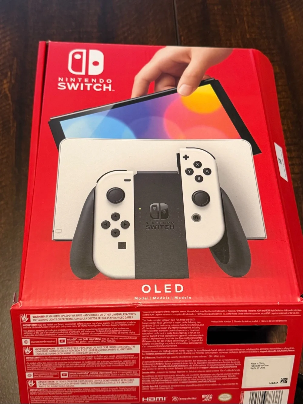 Nintendo Switch OLED Console Bundle in White with Black Case and Two Games